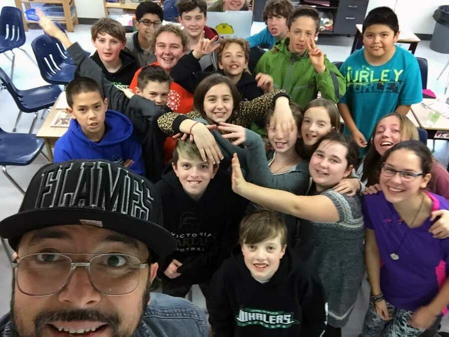 Claudio with youth in schools